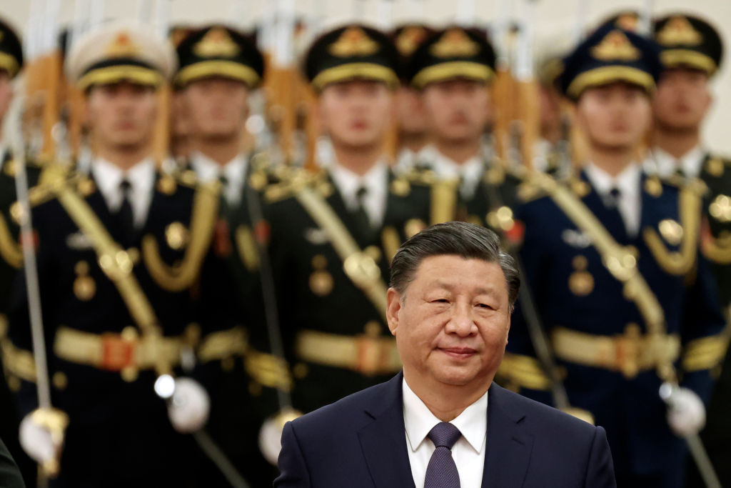 Xi bangs the drum